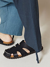 yul エスニック柄アシンメトリーサルエルパンツ（ユニセックス）